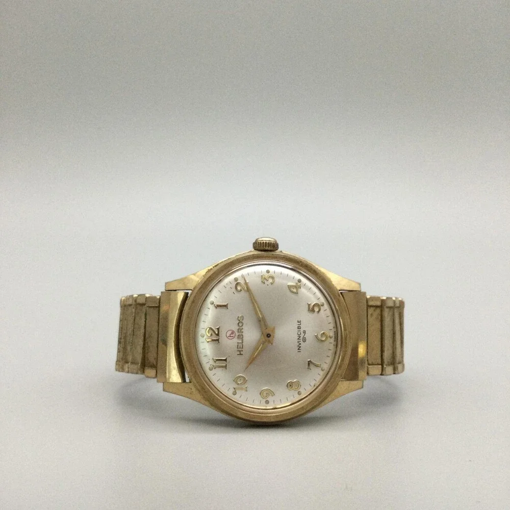 Vintage Helbros Invincible Swiss Mens Watch 33mm Silver Gold Tone Stretch Manual